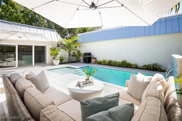 4830 W Blvd, Naples, FL 34103 - swimming pool with outdoor lounge area and a fenced backyard