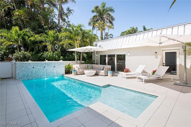 4830 W Blvd, Naples, FL 34103 - view of swimming pool featuring an outdoor hangout area and a patio