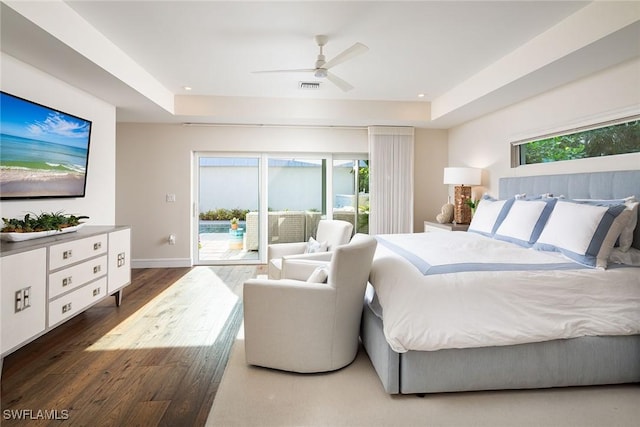 4830 W Blvd, Naples, FL 34103 - bedroom with access to exterior, a raised ceiling, wood finished floors, recessed lighting, and ceiling fan