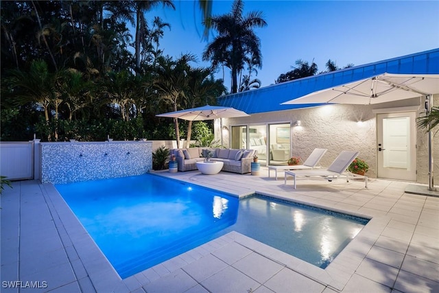4830 W Blvd, Naples, FL 34103 - view of swimming pool with outdoor lounge area and a patio
