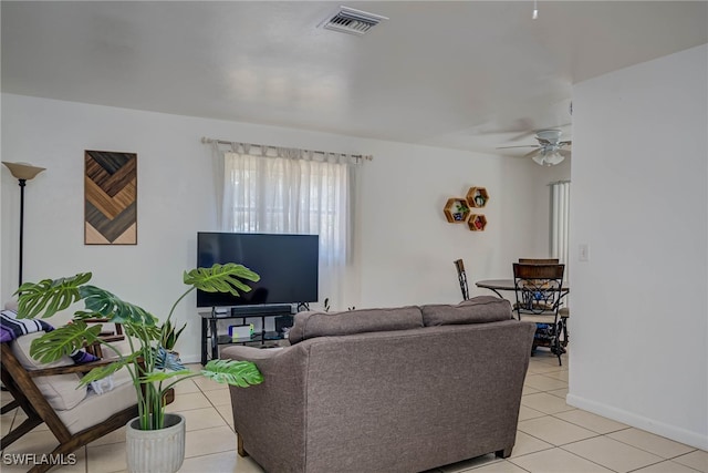 2215 Marilyn Ln, Fort Myers, FL 33905 - living area featuring baseboards, ceiling fan, light tile patterned flooring, and visible vents