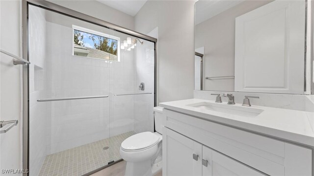 17825 Summerland Key Ct, Fort Myers, FL 33908 - full bathroom with vanity, toilet, and a shower stall