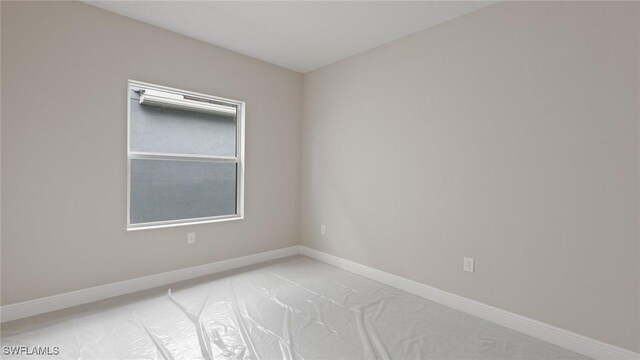 17825 Summerland Key Ct, Fort Myers, FL 33908 - unfurnished room featuring baseboards