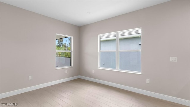 17825 Summerland Key Ct, Fort Myers, FL 33908 - unfurnished room with light wood-type flooring and baseboards