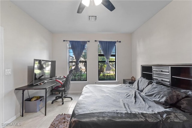 17152 Ashford Ter, Fort Myers, FL 33967 - bedroom featuring tile patterned flooring, baseboards, a ceiling fan, and a desk