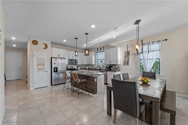 17152 Ashford Ter, Fort Myers, FL 33967 - dining space with recessed lighting, baseboards, and light tile patterned flooring