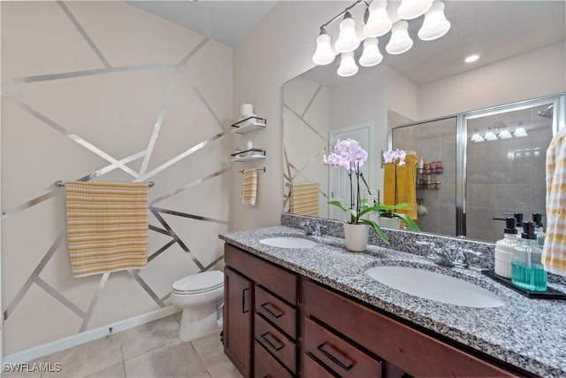 17152 Ashford Ter, Fort Myers, FL 33967 - full bath featuring double vanity, tile patterned floors, a shower stall, and toilet