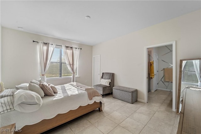17152 Ashford Ter, Fort Myers, FL 33967 - bedroom with light tile patterned floors and baseboards