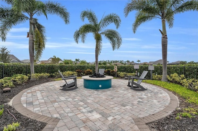 17152 Ashford Ter, Fort Myers, FL 33967 - view of patio / terrace featuring an outdoor fire pit