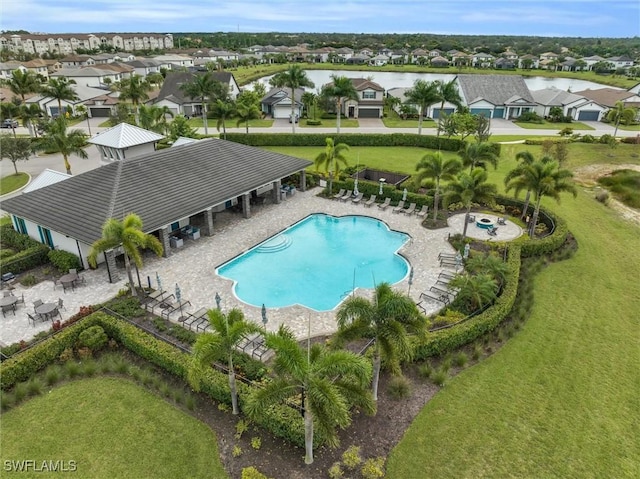 17152 Ashford Ter, Fort Myers, FL 33967 - community pool with a water view, a residential view, and a lawn