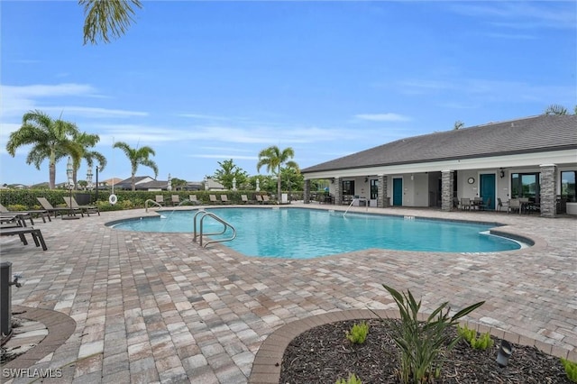 17152 Ashford Ter, Fort Myers, FL 33967 - community pool featuring a patio