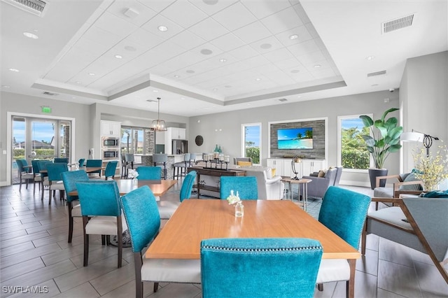 17152 Ashford Ter, Fort Myers, FL 33967 - dining room with a raised ceiling, baseboards, and recessed lighting