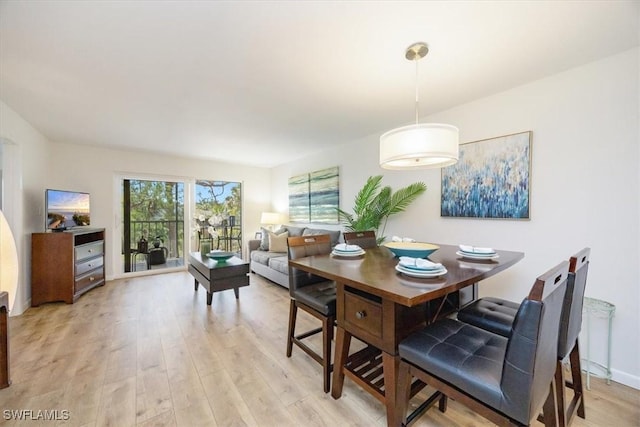 dining room featuring light wood-style floors
