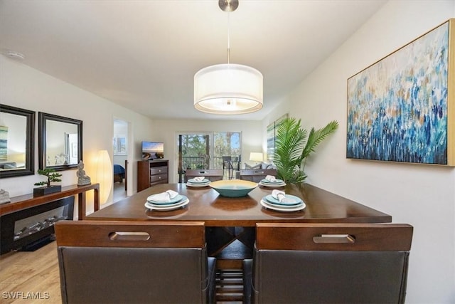 dining room with light wood finished floors