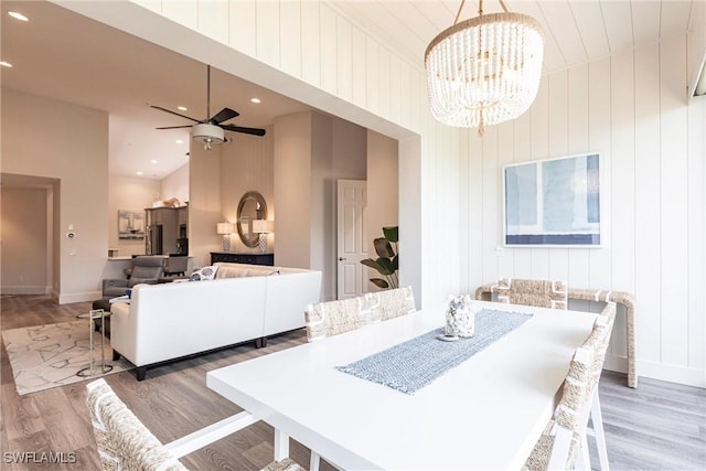 831 Sailaway Ln Unit 203, Naples, FL 34108 - dining room with light wood-style floors, baseboards, a chandelier, ceiling fan, and recessed lighting