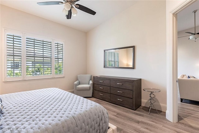 831 Sailaway Ln Unit 203, Naples, FL 34108 - bedroom featuring light wood-type flooring, baseboards, and ceiling fan