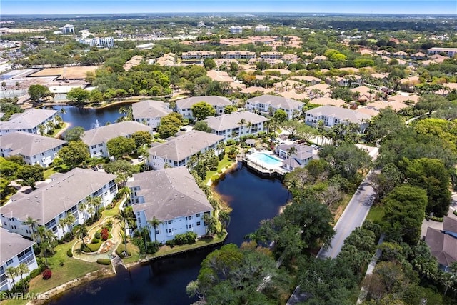 831 Sailaway Ln Unit 203, Naples, FL 34108 - aerial view of property and surrounding area with a large body of water and nearby suburban area