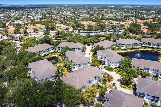831 Sailaway Ln Unit 203, Naples, FL 34108 - aerial view of property and surrounding area featuring a nearby body of water and nearby suburban area