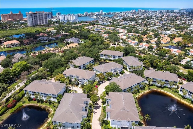 831 Sailaway Ln Unit 203, Naples, FL 34108 - aerial view of property's location featuring a large body of water and nearby suburban area