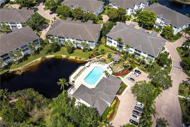 831 Sailaway Ln Unit 203, Naples, FL 34108 - aerial overview of property's location featuring a pool, a nearby body of water, and nearby suburban area
