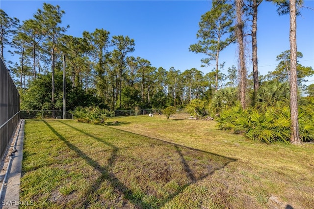 view of yard with fence
