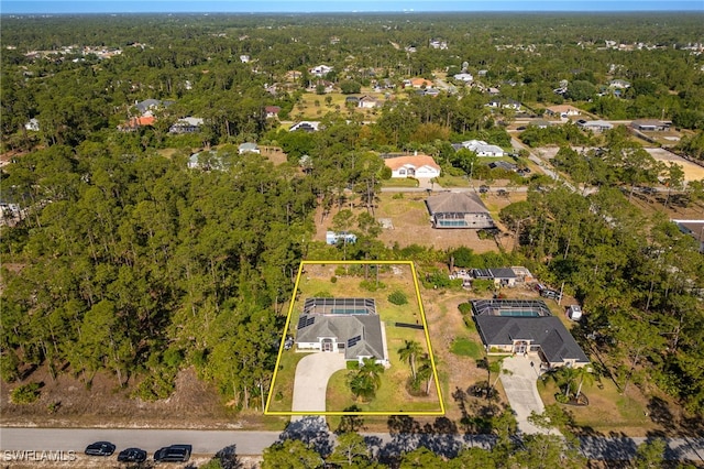 bird's eye view with a view of trees