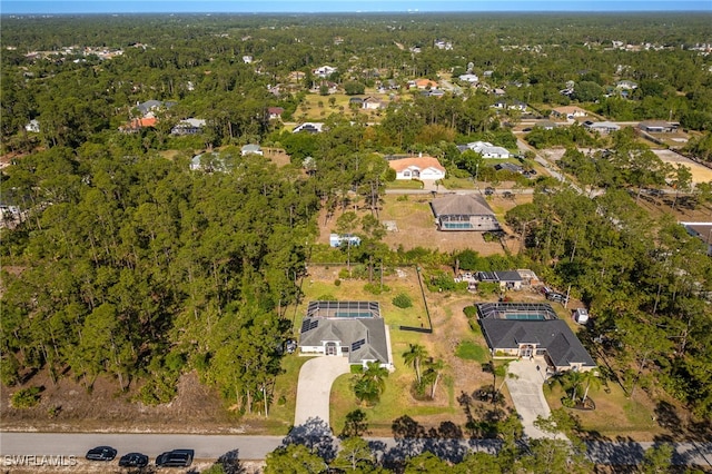 bird's eye view with a view of trees