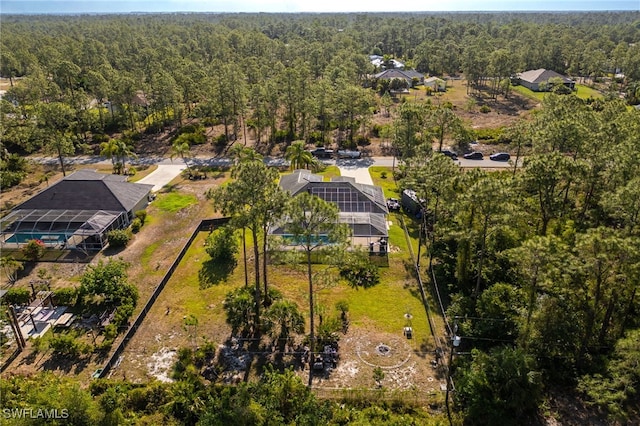 bird's eye view with a forest view
