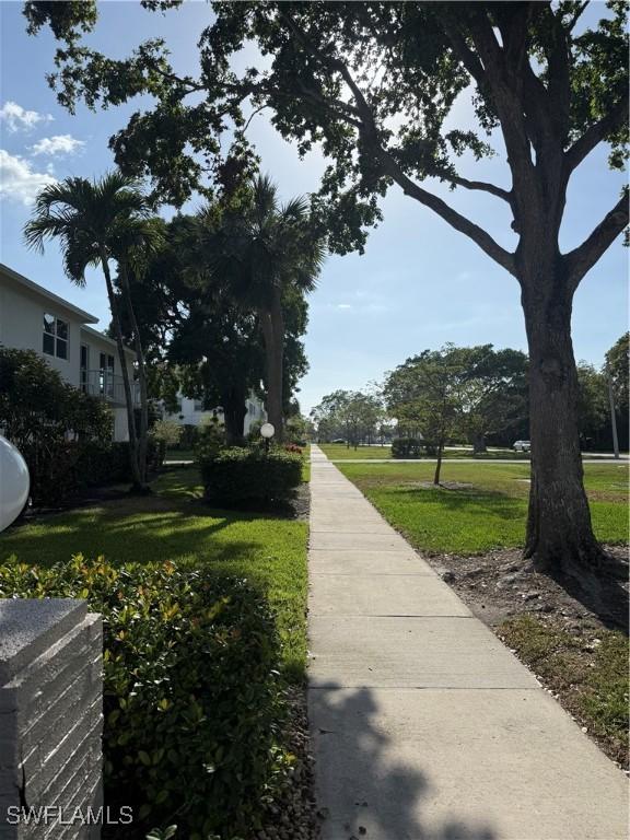 530 Broad Ave S Unit 530, Naples, FL 34102 - surrounding community with a yard