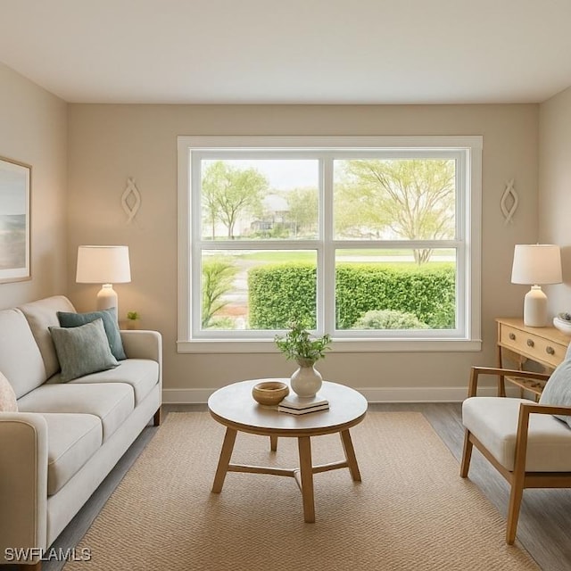 530 Broad Ave S Unit 530, Naples, FL 34102 - living area with baseboards and light wood finished floors
