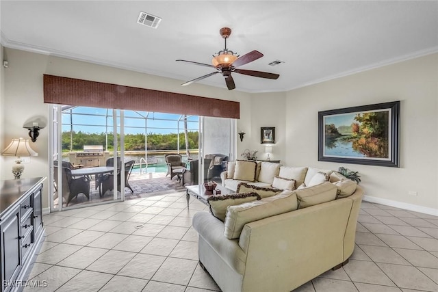 8442 Mallards Way, Naples, FL 34114 - living room featuring crown molding, ceiling fan, a sunroom, light tile patterned floors, and visible vents