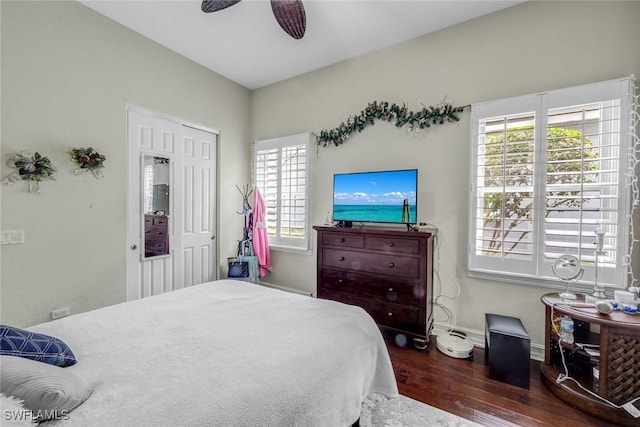 8442 Mallards Way, Naples, FL 34114 - bedroom featuring baseboards, a ceiling fan, wood finished floors, and multiple windows