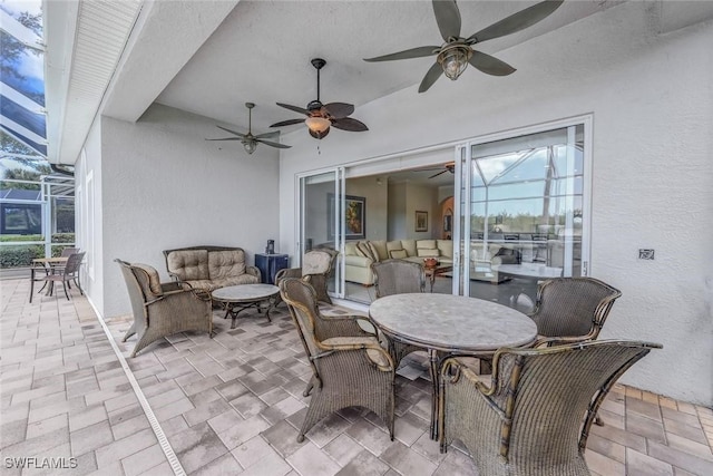8442 Mallards Way, Naples, FL 34114 - view of patio / terrace with ceiling fan, a lanai, and an outdoor hangout area