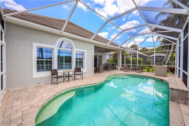 8442 Mallards Way, Naples, FL 34114 - pool with glass enclosure, ceiling fan, and a patio area