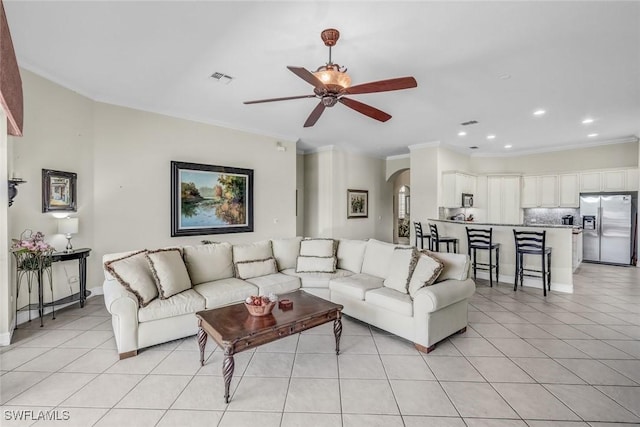 8442 Mallards Way, Naples, FL 34114 - living area featuring a ceiling fan, visible vents, arched walkways, light tile patterned floors, and recessed lighting