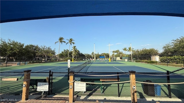 2060 Matecumbe Key Rd Unit 2307, Punta Gorda, FL 33955 - view of tennis court with fence and community basketball court