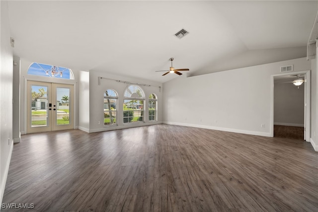 unfurnished living room featuring visible vents, lofted ceiling, wood finished floors, ceiling fan, and french doors