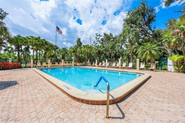 15177 Parkside Dr Unit 104, Fort Myers, FL 33908 - pool featuring a patio area and fence
