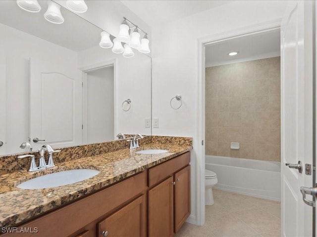 2478 Heydon Cir E, Naples, FL 34120 - full bathroom featuring toilet, tile patterned flooring, a sink, and double vanity