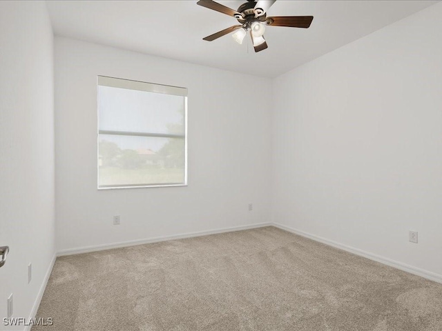 2478 Heydon Cir E, Naples, FL 34120 - unfurnished room featuring baseboards, a ceiling fan, and carpet flooring
