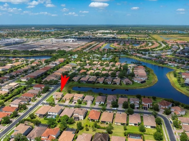 2478 Heydon Cir E, Naples, FL 34120 - bird's eye view featuring a water view and a residential view