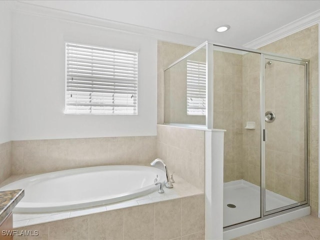 2478 Heydon Cir E, Naples, FL 34120 - full bath with ornamental molding, a bath, a shower stall, and tile patterned floors