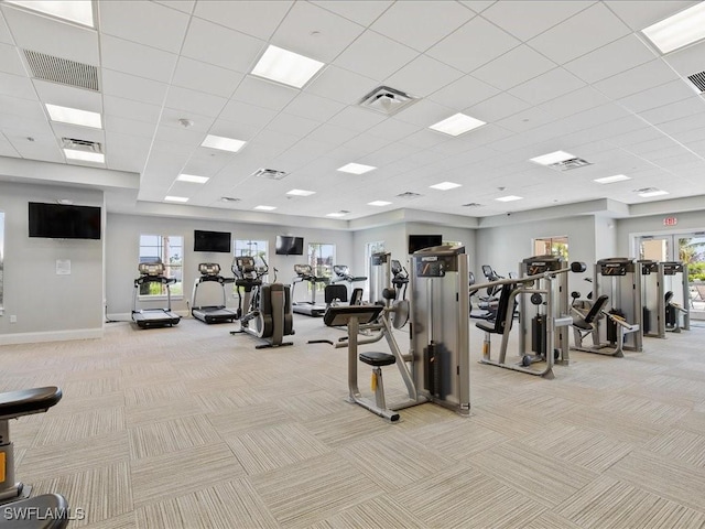 2478 Heydon Cir E, Naples, FL 34120 - workout area featuring visible vents, light carpet, and baseboards