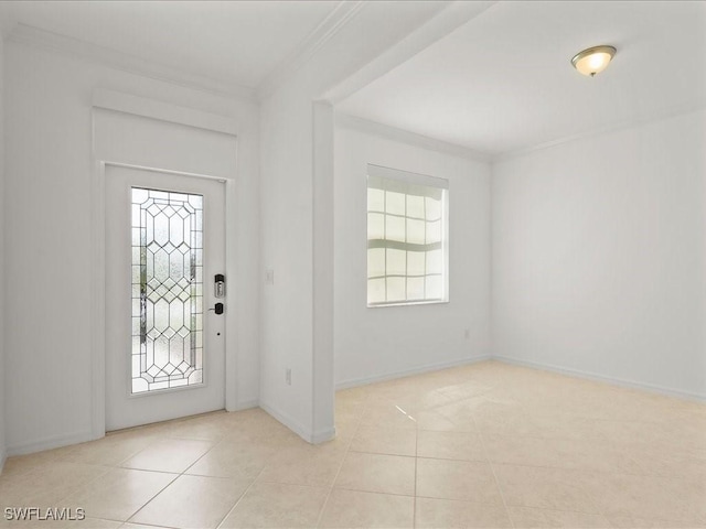 2478 Heydon Cir E, Naples, FL 34120 - foyer entrance featuring baseboards, tile patterned flooring, and crown molding