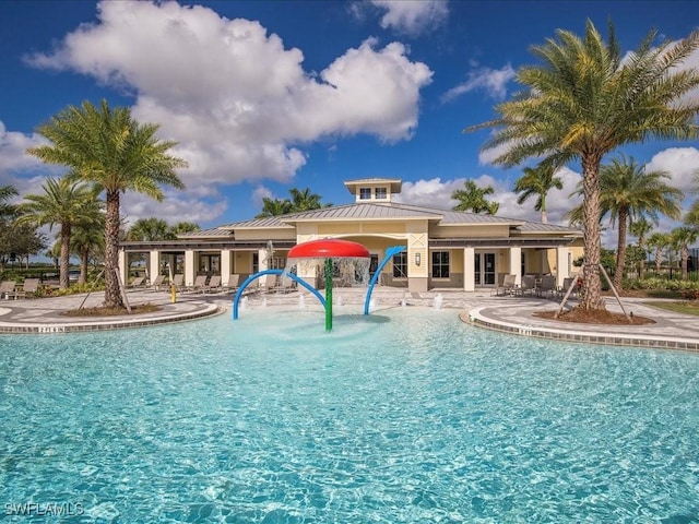 2478 Heydon Cir E, Naples, FL 34120 - community pool with a patio
