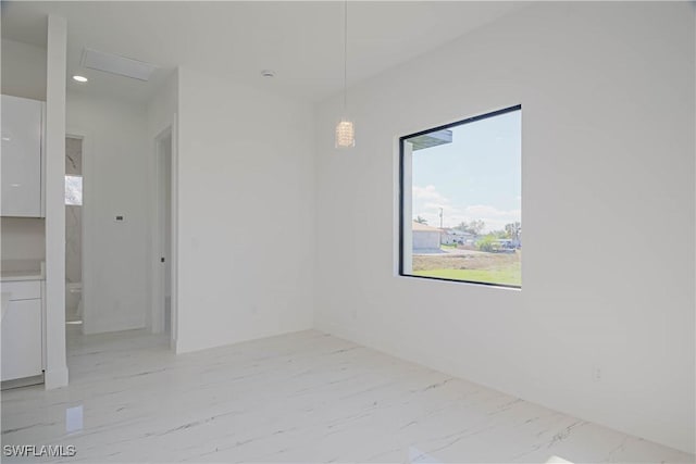 empty room with recessed lighting