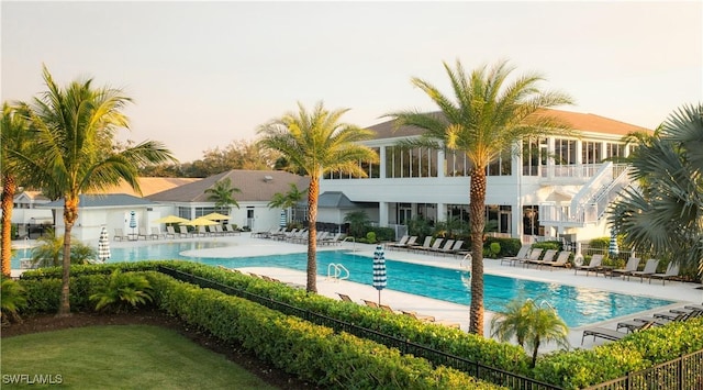 12050 Santaluz Dr Unit 101, Fort Myers, FL 33913 - community pool featuring a patio