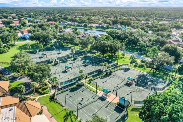 aerial view featuring a water view and a residential view