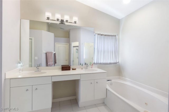 bathroom with a bath, tile patterned flooring, double vanity, and a sink