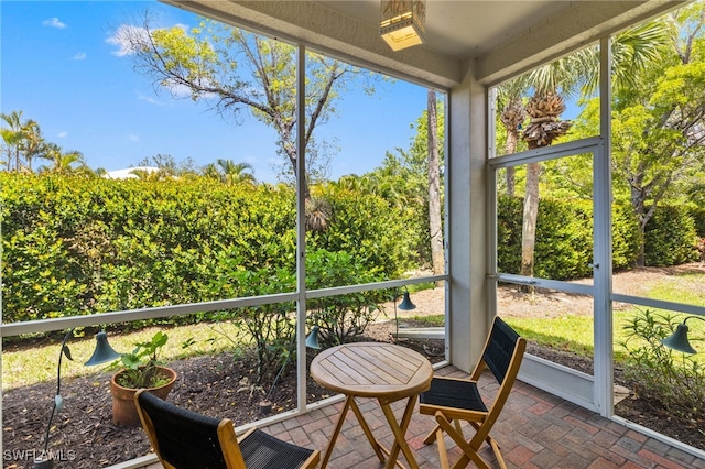 1305 Sweetwater Cv Unit 104, Naples, FL 34110 - view of sunroom / solarium
